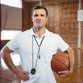 portrait of confident basketball coach